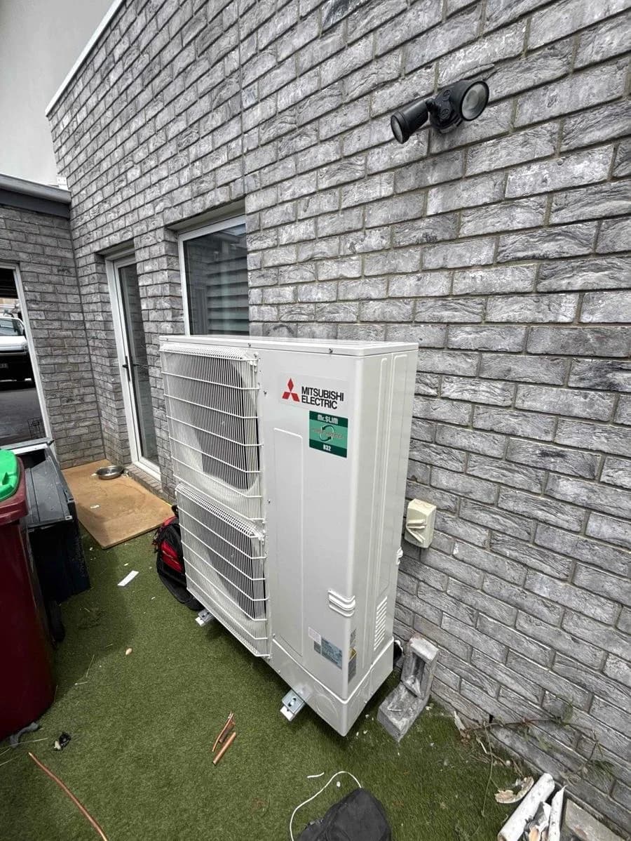 Mitsubishi Electric outdoor unit installed for a whole-home ducted air-conditioning system in Victoria